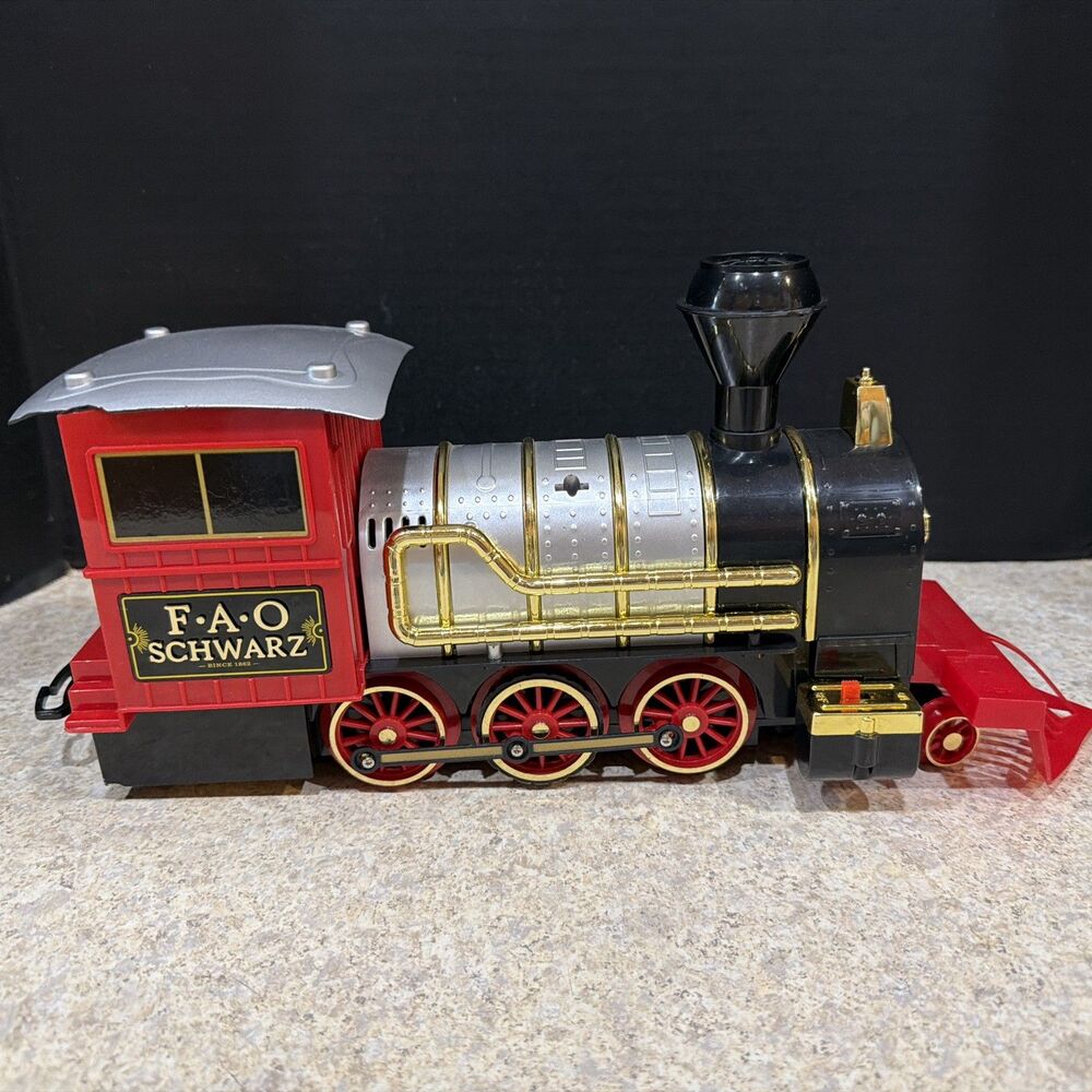 FAO Schwarz Motorized Train Replacement Locomotive tested/works no battery door